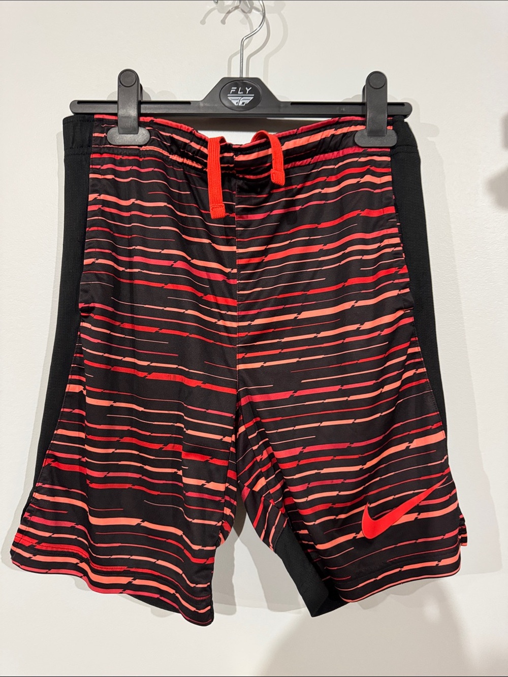 Nike Kids Black Shorts with Red Orange peach Stripe Accents